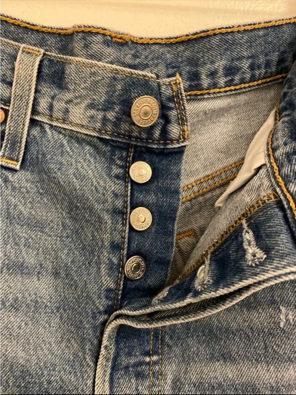 High-Rise Distressed Denim Shorts